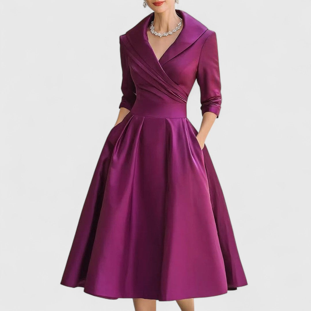 Vestido midi cruzado con escote en V y bolsillos | Manga tres cuartos
