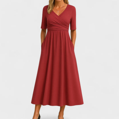 Elegante vestido midi con escote cruzado | Con bolsillos laterales