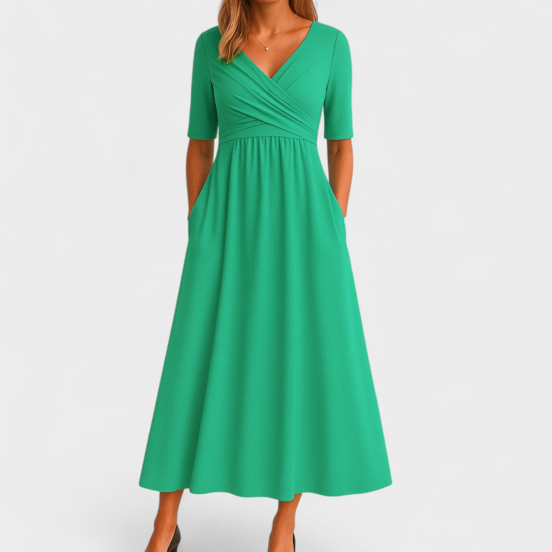 Elegante vestido midi con escote cruzado | Con bolsillos laterales