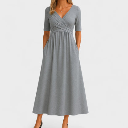Elegante vestido midi con escote cruzado | Con bolsillos laterales
