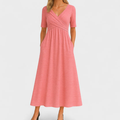 Elegante vestido midi con escote cruzado | Con bolsillos laterales