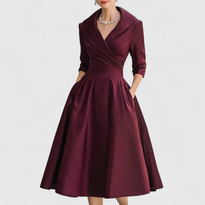 Vestido midi cruzado con escote en V y bolsillos | Manga tres cuartos