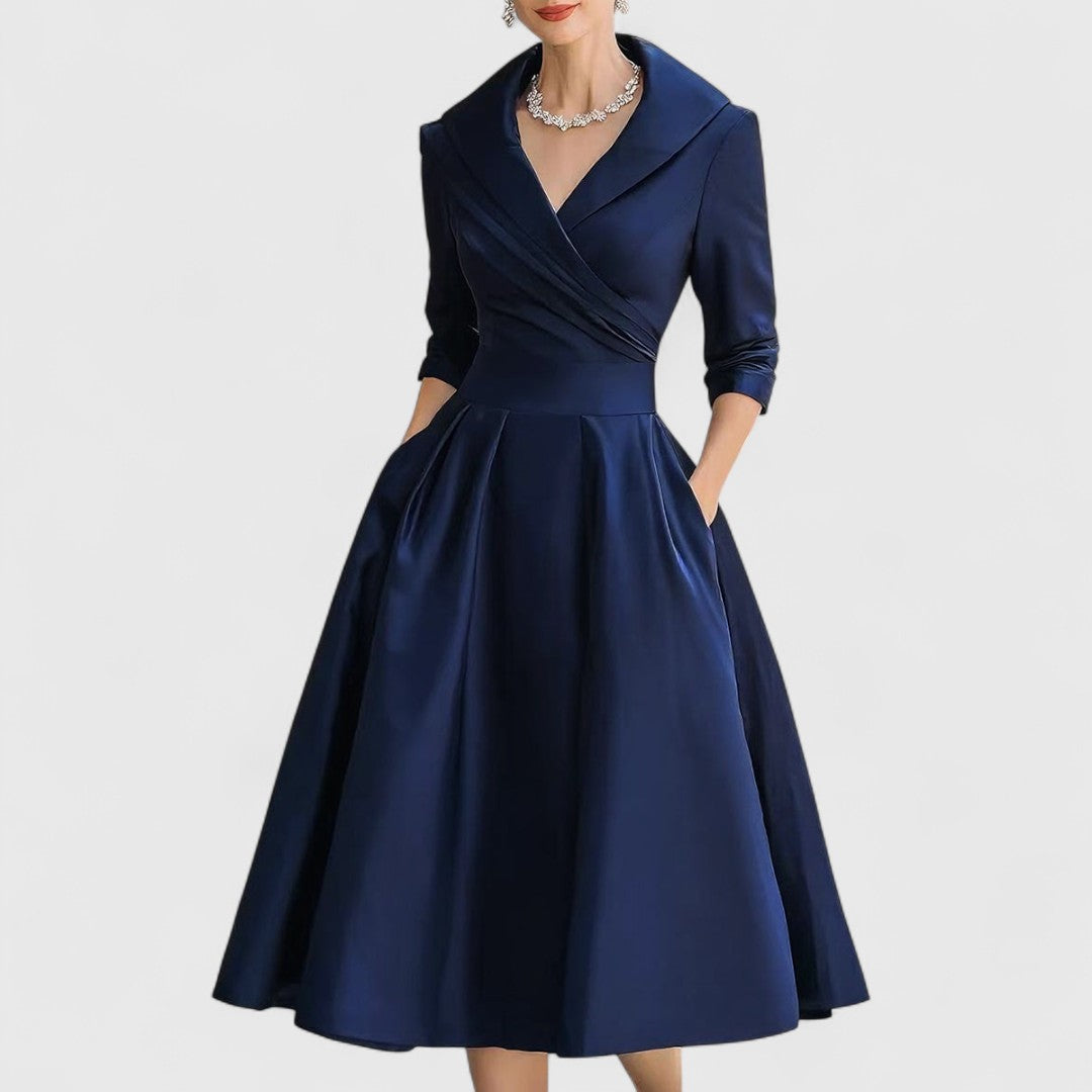 Vestido midi cruzado con escote en V y bolsillos | Manga tres cuartos