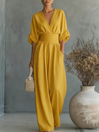 Mono elegante con escote en V y pantalón ancho para mujer